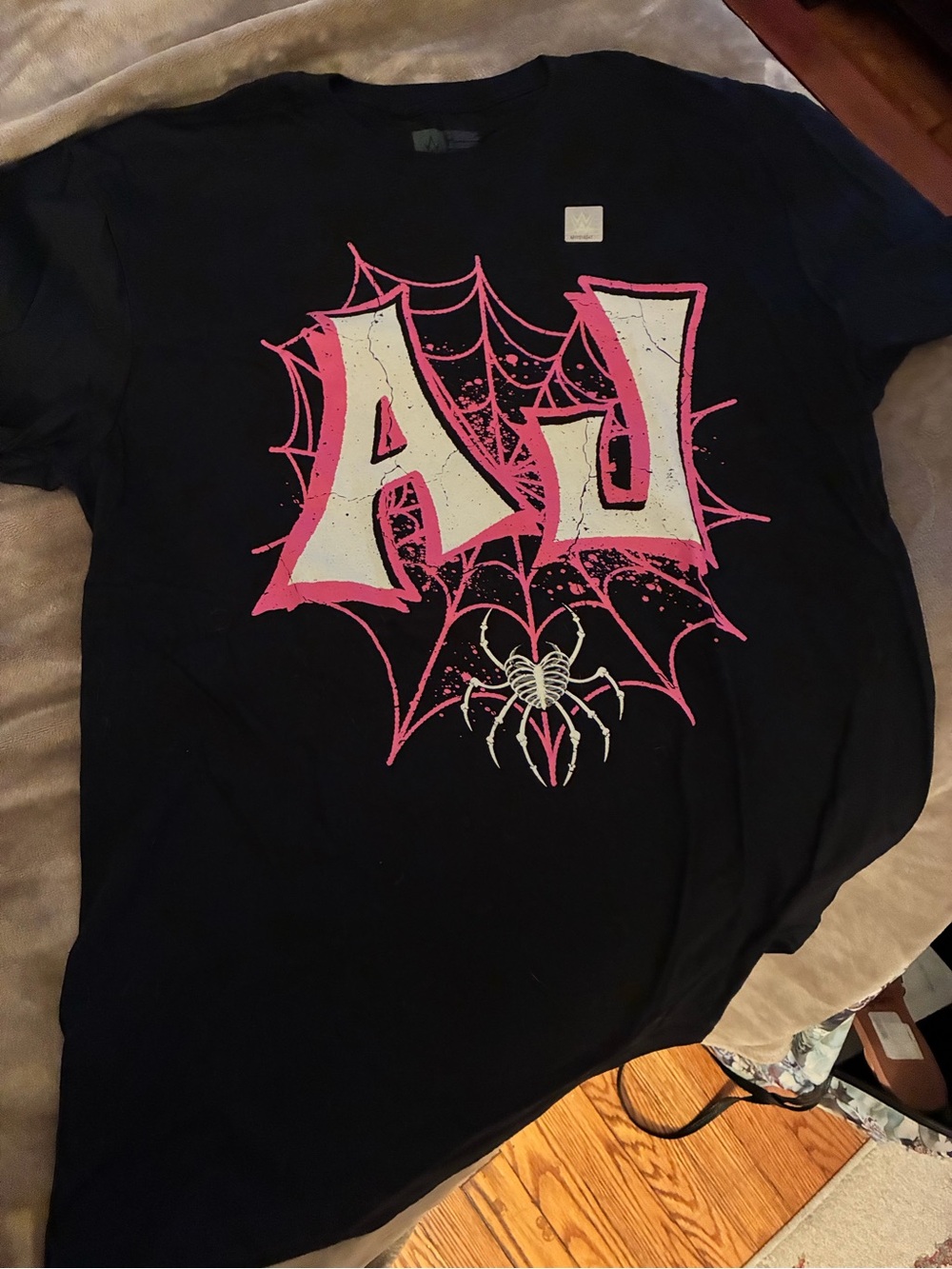 AJ Lee WWE Graphic Tee - Black with Pink & White Spider Web Design